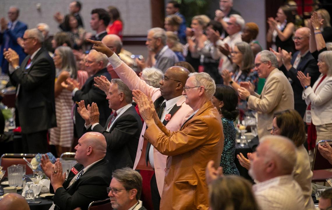 North Carolina Republican Party Convention delegates rise to show support for former President Donald Trump following his comment about immigration during his speech at the Koury Convention Center on Saturday, June 10, 2023 in Greensboro, N.C.