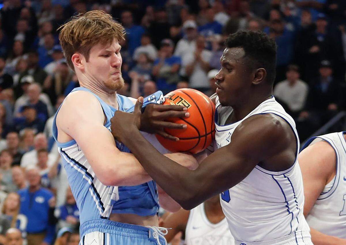 Keba Keita (right) of BYU fights for control of the ball with Henri Veesaar of UNC during the second half of their exhibition game at the Delta Center on October 24, 2025 in Salt Lake City, Utah.