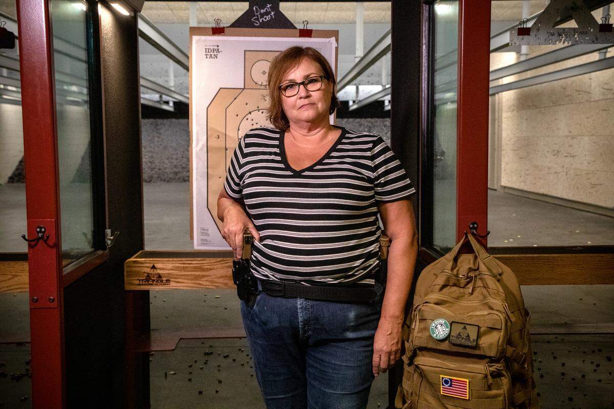 Terry Marsh poses after an all women’s training class at Triangle Shooting Academy in Raleigh Thursday, August 1, 2019. A 2015 survey by public health researchers from Harvard and Northeastern universities found that female gun owners are increasing while men gun owners decrease.