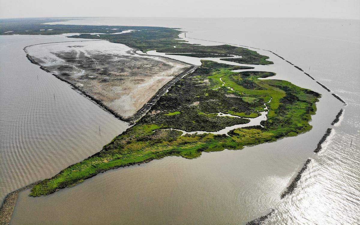 A $50 million project, funded by BP restoration money, hopes to stabilize the erosion of marsh at Heron Bay in Hancock County. The project included a six mile living shoreline and a line of breakwaters to protect from wave energy, construct of 46 acres of reclaimed marsh using dredge material and 46 acres of subtidal oyster reef.
