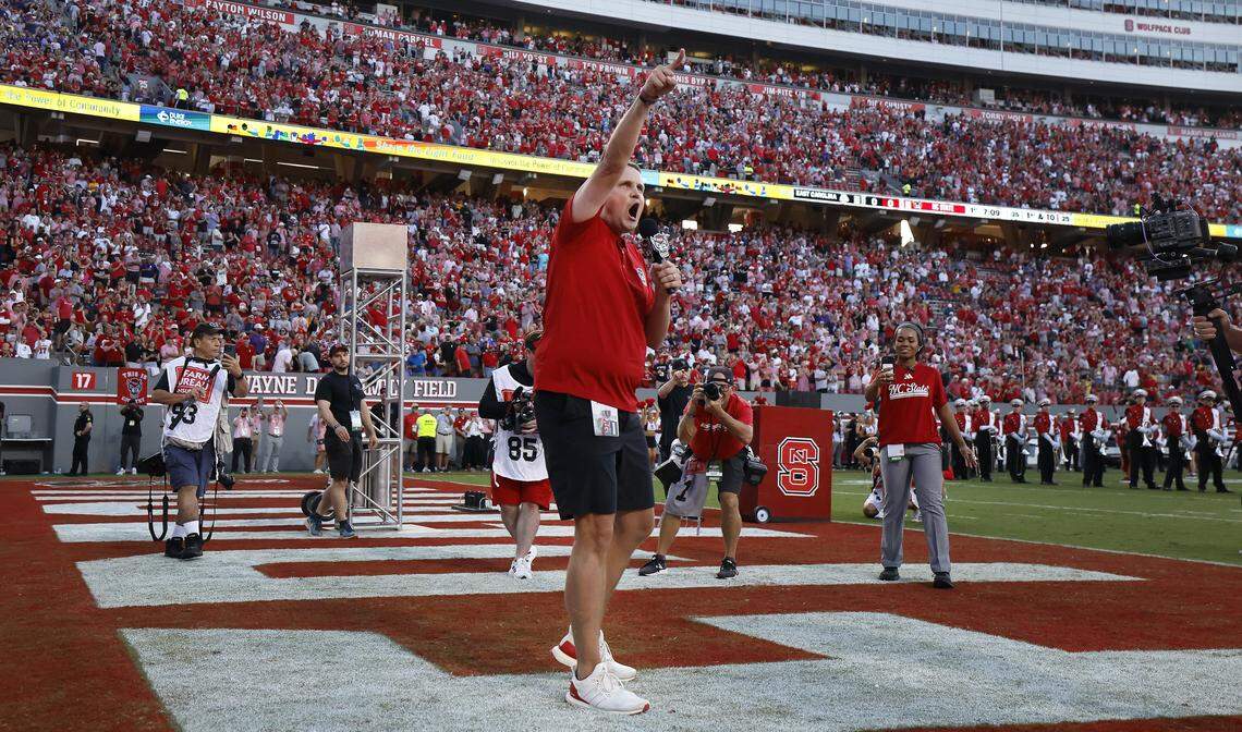 N.C. State basketball coach Will Wade pumps the crowd up before Wolfpack’s game against ECU at Carter-Finley Stadium in Raleigh, N.C., Thursday, August 28, 2025.