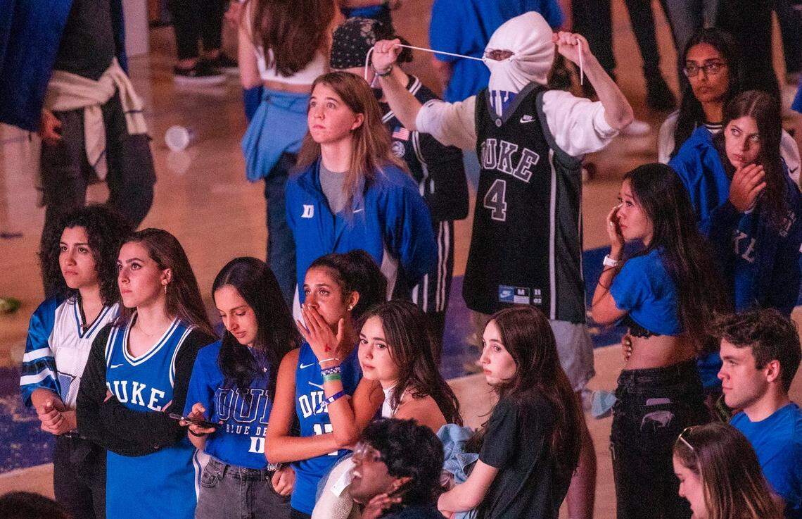 Duke students at Cameron Indoor Stadium react after losing to UNC 81-77 in the Final Four Saturday, April 7, 2022.