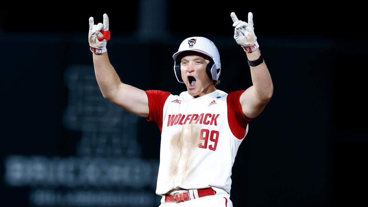 N.C. State’s Alec Makarewicz (99) celebrates after hitting a double in the eighth inning during N.C. State’s 9-2 victory over Bryant in the NCAA Raleigh Regional at Doak Field Friday, May 31, 2024.