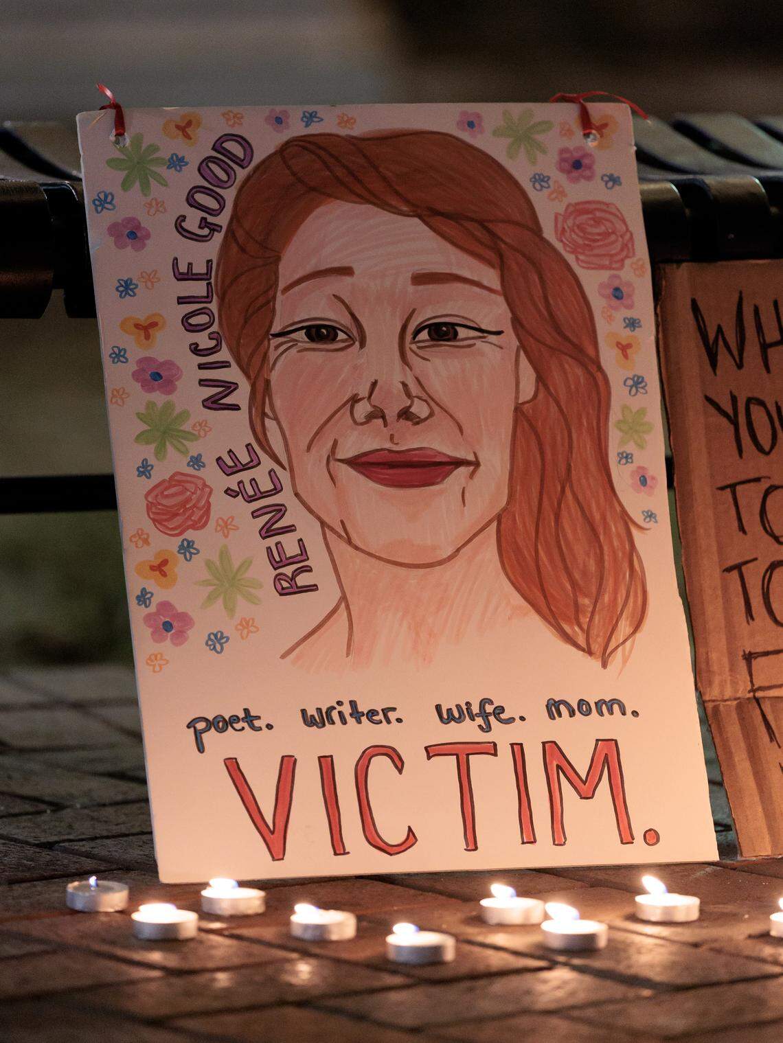 Candles surround a memorial for Renee Nicole Good following a protest in downtown Durham on Thursday, Jan. 8, 2026. Good was shot and killed by an ICE agent in Minneapolis on Wednesday. 