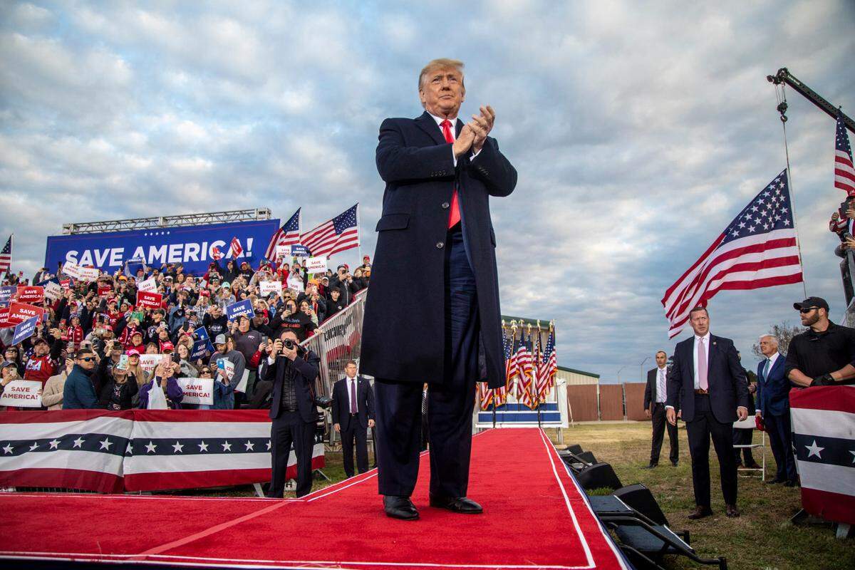 Former President Donald Trump takes the stage during a rally in Selma Saturday, April 9, 2022.