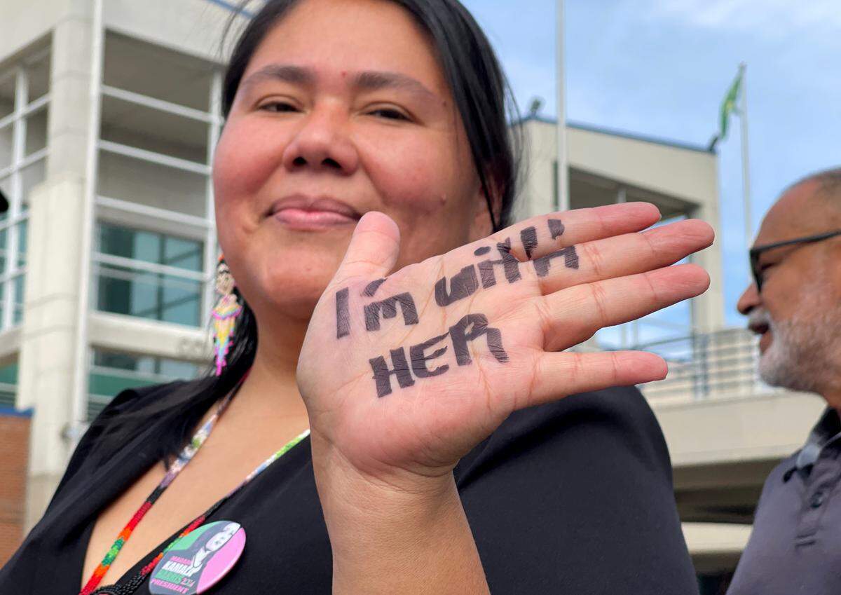 Carmen Rodriguez of Clayton waiting in line to attend a rally for Vice President and democratic nominee for president Kamala Harris at the Greensboro Coliseum in Greensboro, N.C., Thursday, Sept. 12, 2024.