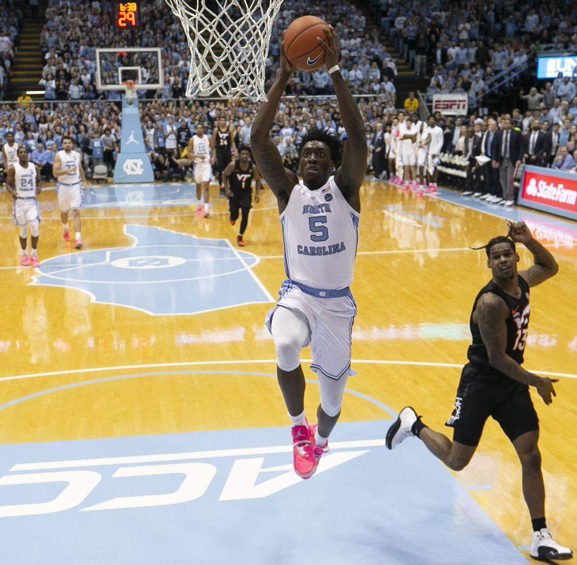 North Carolina’s Nassir Little (5) breaks to the basket for a dunk on a fast break in the first half against Virginia Tech on Monday, January 21, 2019 at the Smith Center in Chapel Hill, N.C. Little scored 23 points in the Tar Heels’ victory.