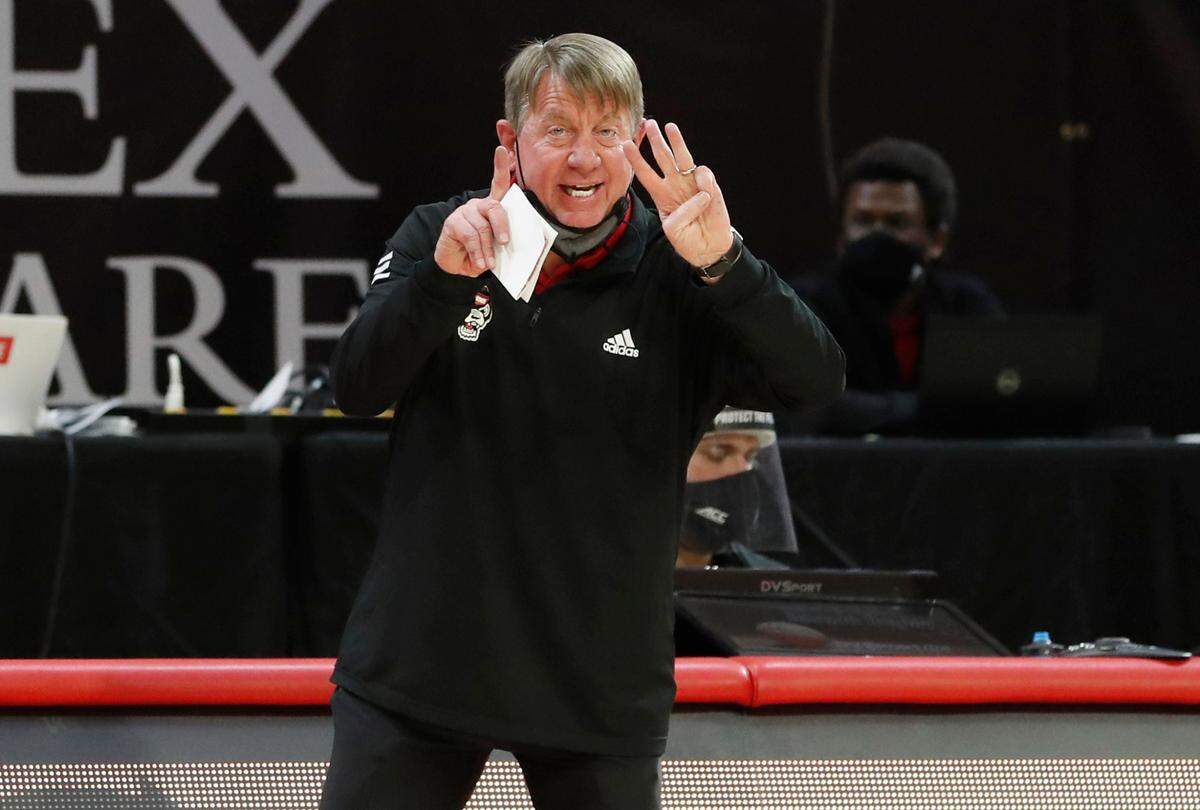 N.C. State head coach Wes Moore yells instructions to his team during the second half of N.C. State’s 83-53 victory over Pittsburgh at Reynolds Coliseum in Raleigh, N.C., Thursday, February 25, 2021.