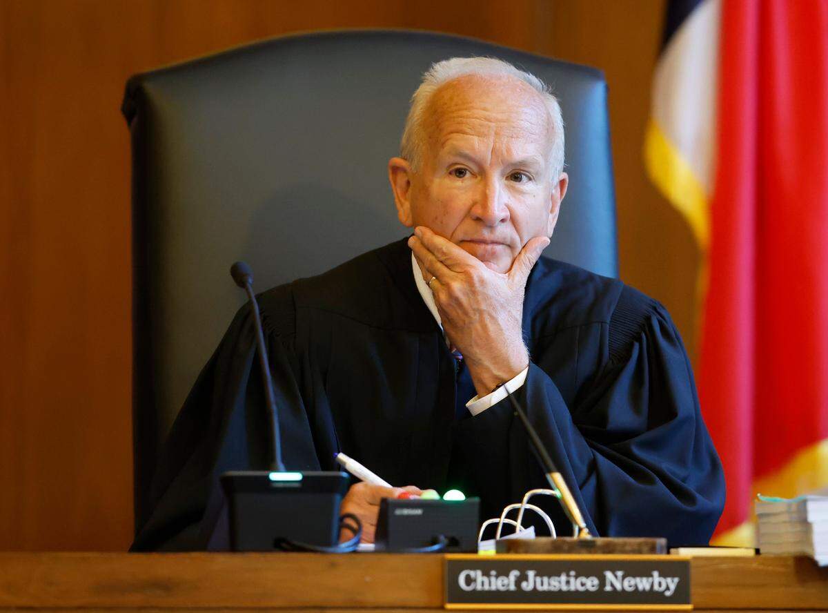 Chief Justice Paul Newby listens during oral arguments at the Supreme Court of North Carolina in Raleigh, N.C., Monday, May 9, 2022.