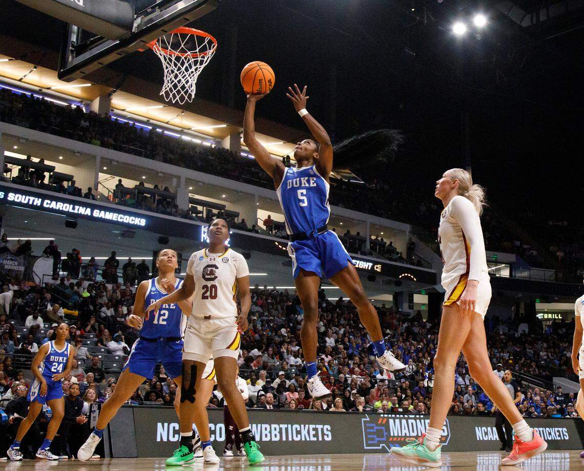 Duke’s Oluchi Okananwa drives to the basket past South Carolina’s Chloe Kitts during the first half of the Blue Devils’ 54-50 loss in the NCAA Tournament Elite Eight at Legacy Arena on Sunday, March 30, 2025, in Birmingham, Ala.