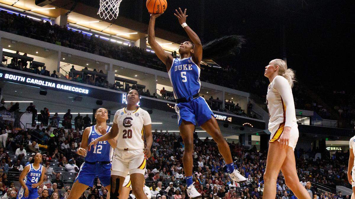 Duke’s Oluchi Okananwa drives to the basket past South Carolina’s Chloe Kitts during the first half of the Blue Devils’ 54-50 loss in the NCAA Tournament Elite Eight at Legacy Arena on Sunday, March 30, 2025, in Birmingham, Ala.