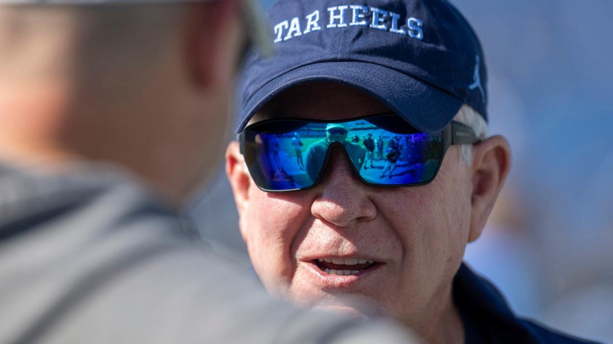 Georgia Tech head coach Brent Key talks with North Carolina coach Mack Brown prior to their game on Saturday, October 12, 2024 at Kenan Stadium in Chapel Hill, N.C.