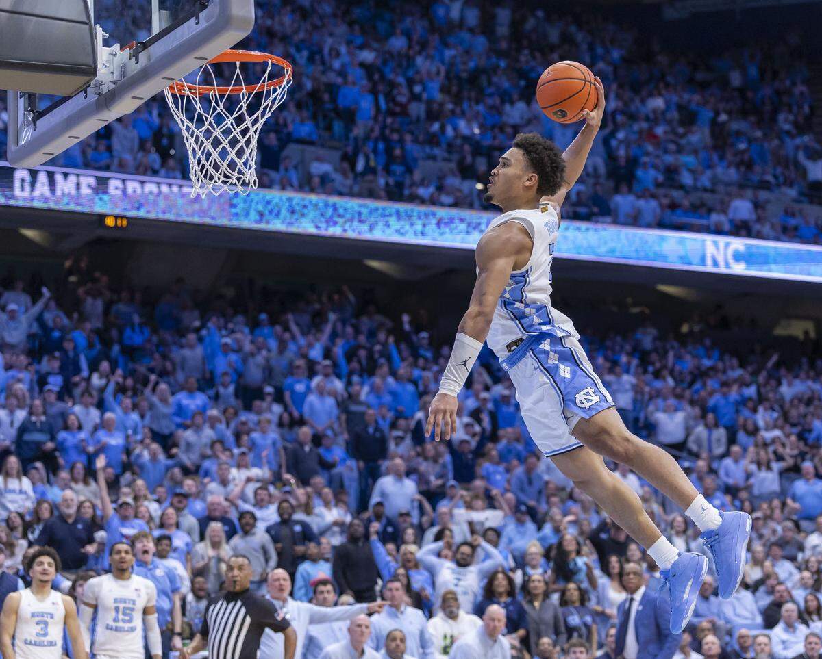 North Carolina guard Seth Trimble (7) soars to the rim for a dunk on a fast break in the second half against Virginia Tech on Saturday, February 28, 2026 at the Smith Center in Chapel Hill, N.C.