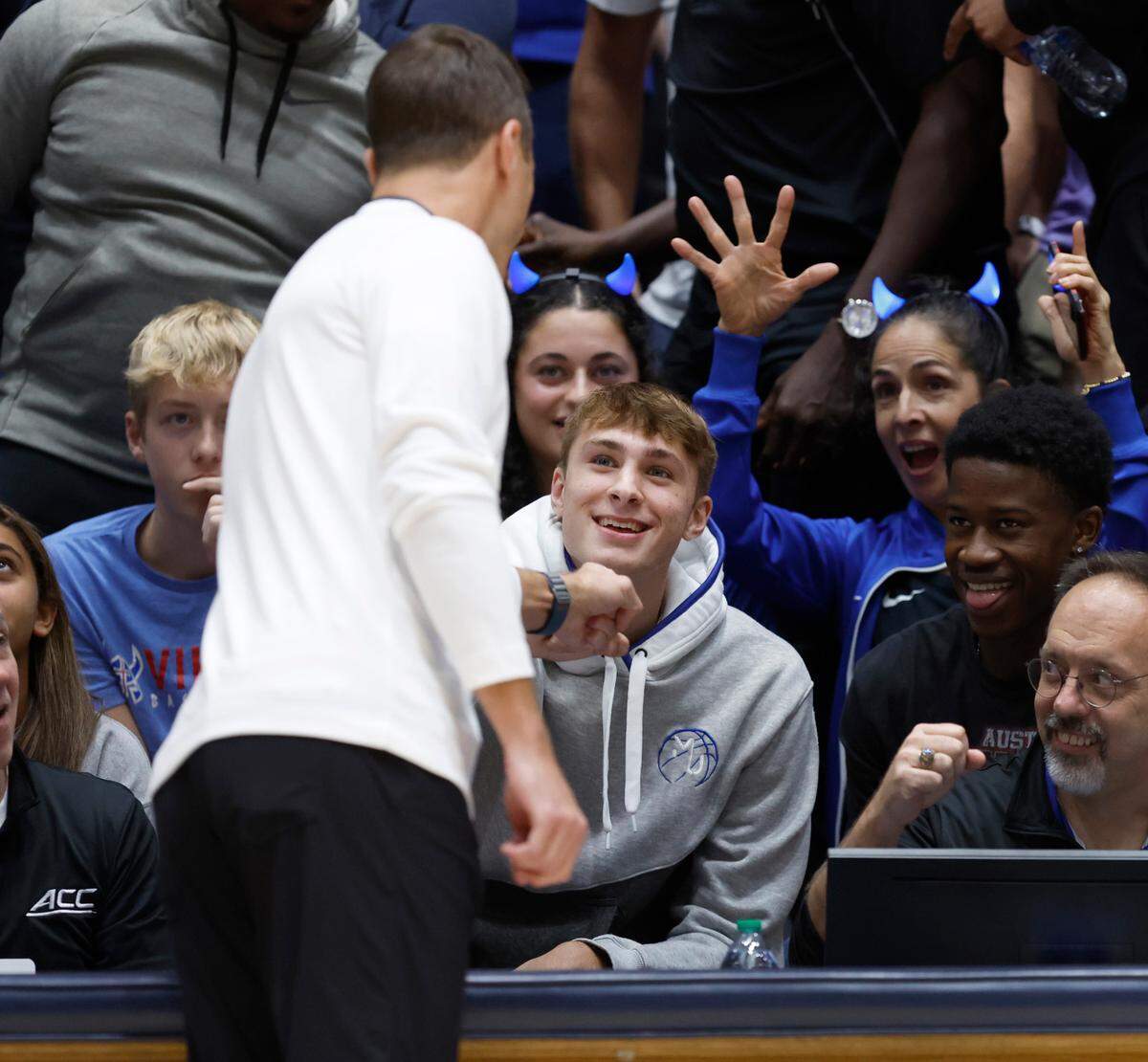 Duke head coach Jon Scheyer greets Cooper Flagg during Duke basketball’s Countdown to Craziness at Cameron Indoor Stadium in Durham, N.C., Friday, Oct. 20, 2023.
