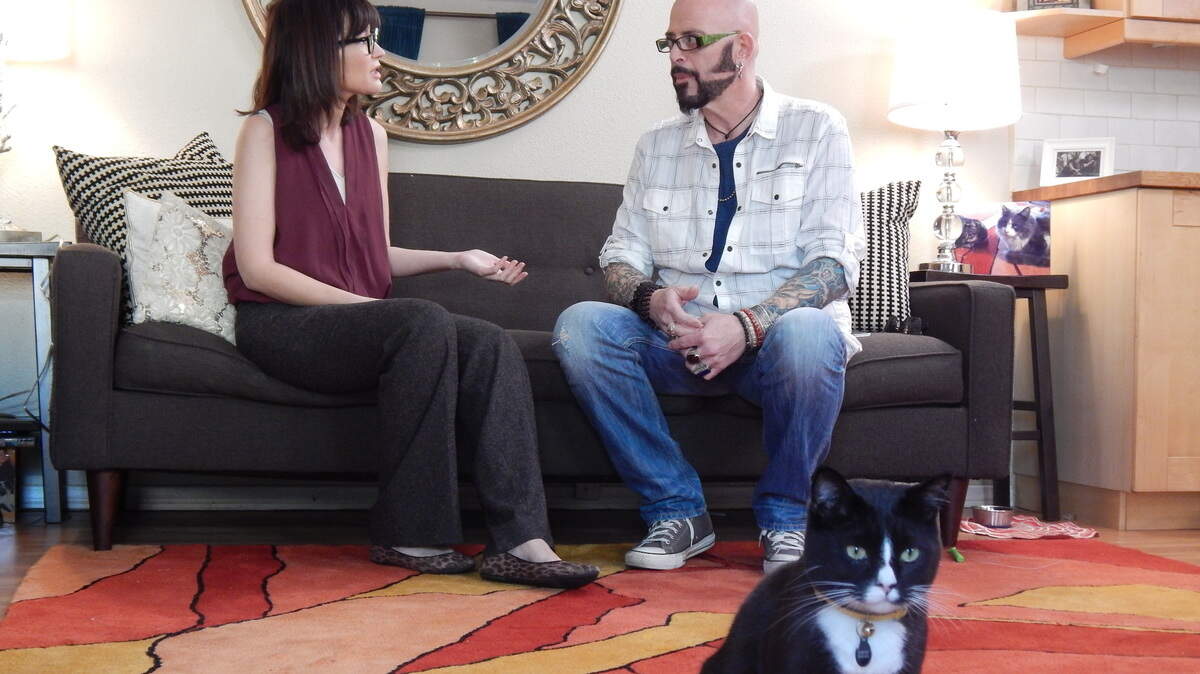 Jackson Galaxy, shown here helping a cat owner during Season 7 of “My Cat From Hell,” starts Season 11 of the Animal Planet series doing virtual visits during the global pandemic..