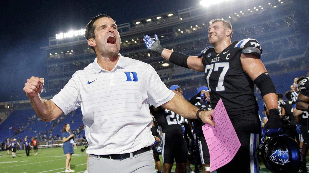 Duke head coach Manny Diaz celebrates following the Blue Devils’ 45-33 win over N.C. State on Saturday, Sept. 20, 2025, at Wallace Wade Stadium in Durham, N.C.