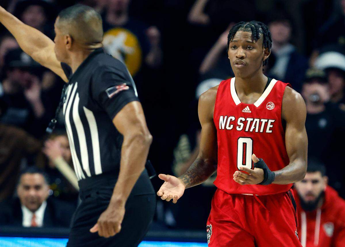 N.C. State’s Terquavion Smith (0) can’t believe he was called for his third foul during the first half of N.C. State’s game against Wake Forest at Joel Coliseum in Winston-Salem, N.C., Saturday, Jan. 28, 2023.