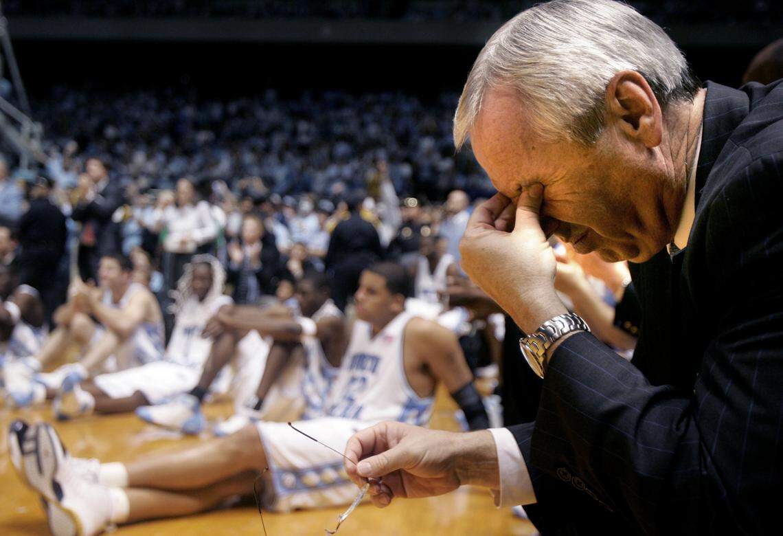 UNCDUKE38.SP.030605.SDL -- UNC’s head coach Roy Williams get emotional listening to the post-games speeches by the Tar Heels’ seniors after beating their rival Duke 75-73 and winning the ACC regular season championship. Staff Photo by Scott Lewis