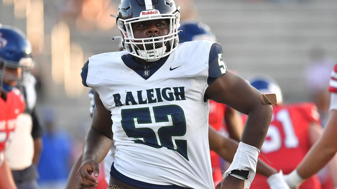 Southeast Raleigh’s Chase Robinson (52) looks to the sidelines between downs in the game versus Wake Forest. The Southeast Raleigh Bulldogs and the Wake Forest Cougars met in a non-conference game in Wake Forest, N.C. on September 1, 2023.