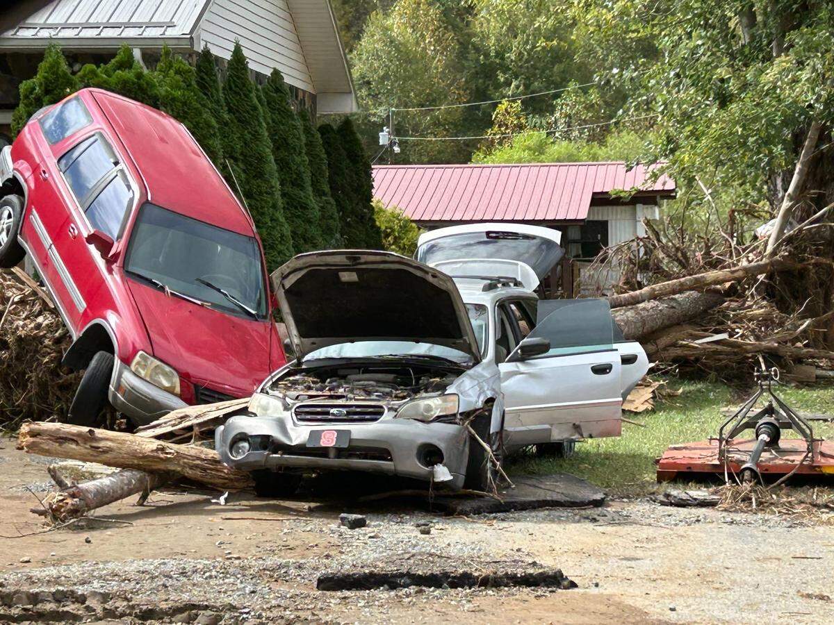 Flipped cars and debris are part of the devastation and damage left behind by Hurricane Helene in Western North Carolina’s Avery County on Oct. 1, 2024.