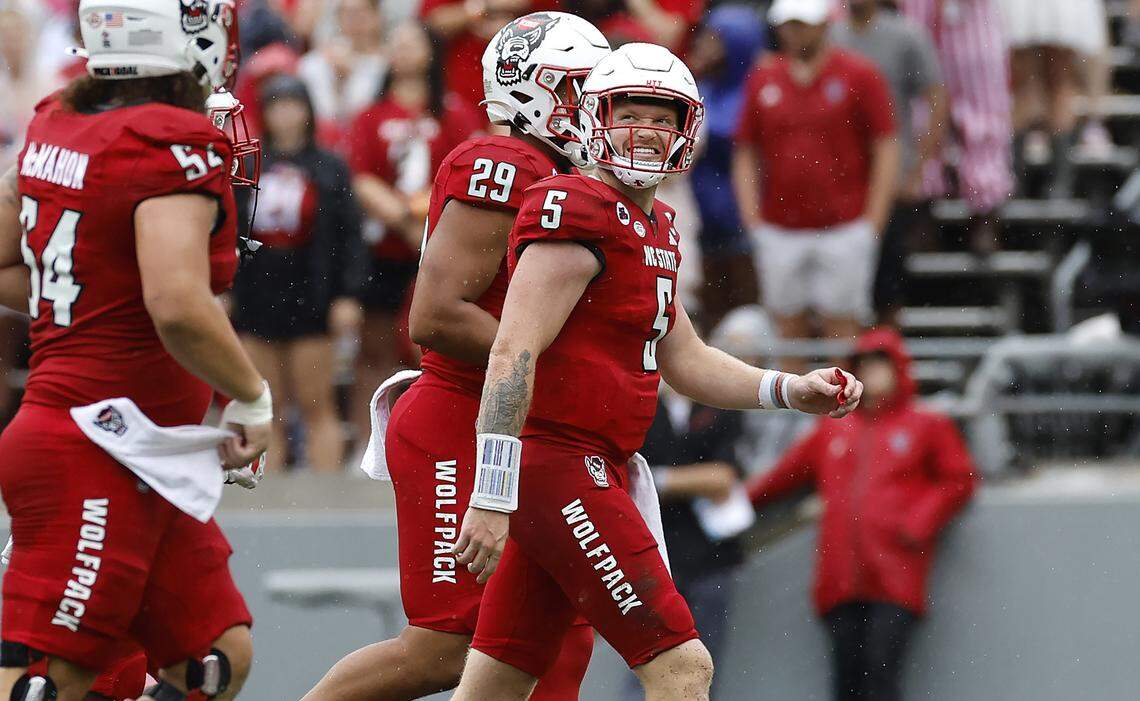 N.C. State quarterback Brennan Armstrong (5) looks to the scoreboard as he walks off the field after throwing an interception during the first half of N.C. State’s game against Notre Dame at Carter-Finley Stadium in Raleigh, N.C., Saturday, Sept. 9, 2023.