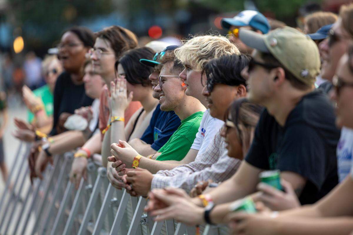 Fans watch as Eshu Tune performs Thursday, Sept. 7 2023 st Moore Square in Raleigh during the annual Hopscotch Music Festival.