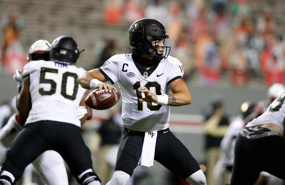 Wake Forest quarterback Sam Hartman (10) prepares to pass during the first half of N.C. State’s game against Wake Forest at Carter-Finley Stadium in Raleigh, N.C, Saturday, Sept. 19, 2020.