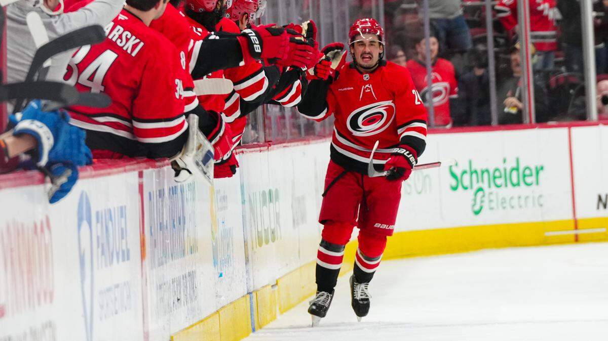 Carolina Hurricanes center Seth Jarvis celebrates his goal against the Colorado Avalanche during the second period at Lenovo Center on Thursday, Dec. 5, 2024.