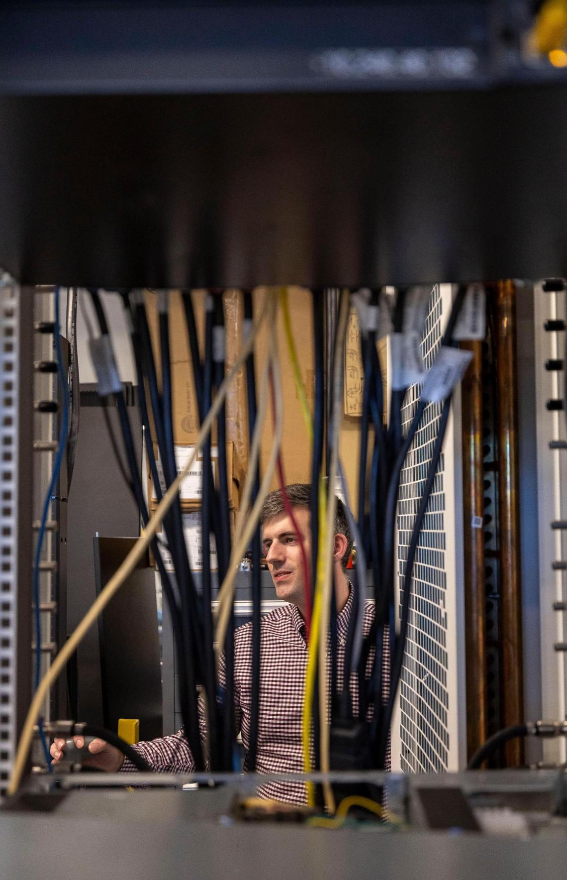 Lenovo thermal engineer Scott Holland, works in a lab where engineers are developing systems to cool data centers using fluids on Tuesday, January 28, 2025 in Morrisville, N.C. The fluids circulate internally to remove heat inside servers, providing for better efficiency.