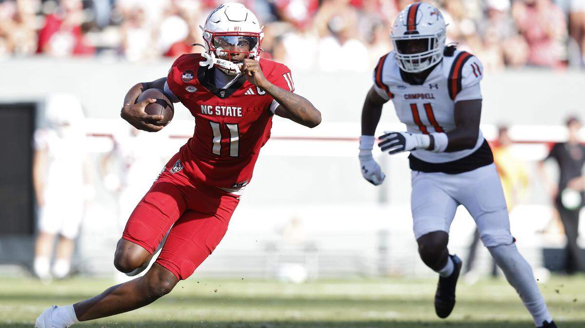 N.C. State quarterback CJ Bailey runs the ball during the second half of the Wolfpack’s 56-10 win over Campbell on Saturday, Oct. 4, 2025, at Carter-Finley Stadium in Raleigh, N.C.