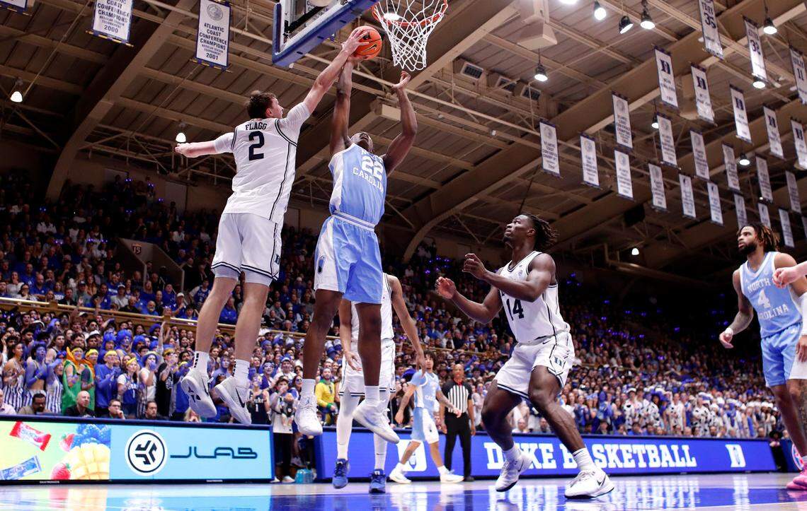 Duke’s Cooper Flagg (2) blocks the shot by North Carolina’s Ven-Allen Lubin (22) during Duke’s 87-70 victory over UNC at Cameron Indoor Stadium in Durham, N.C., Saturday, Feb. 1, 2025.