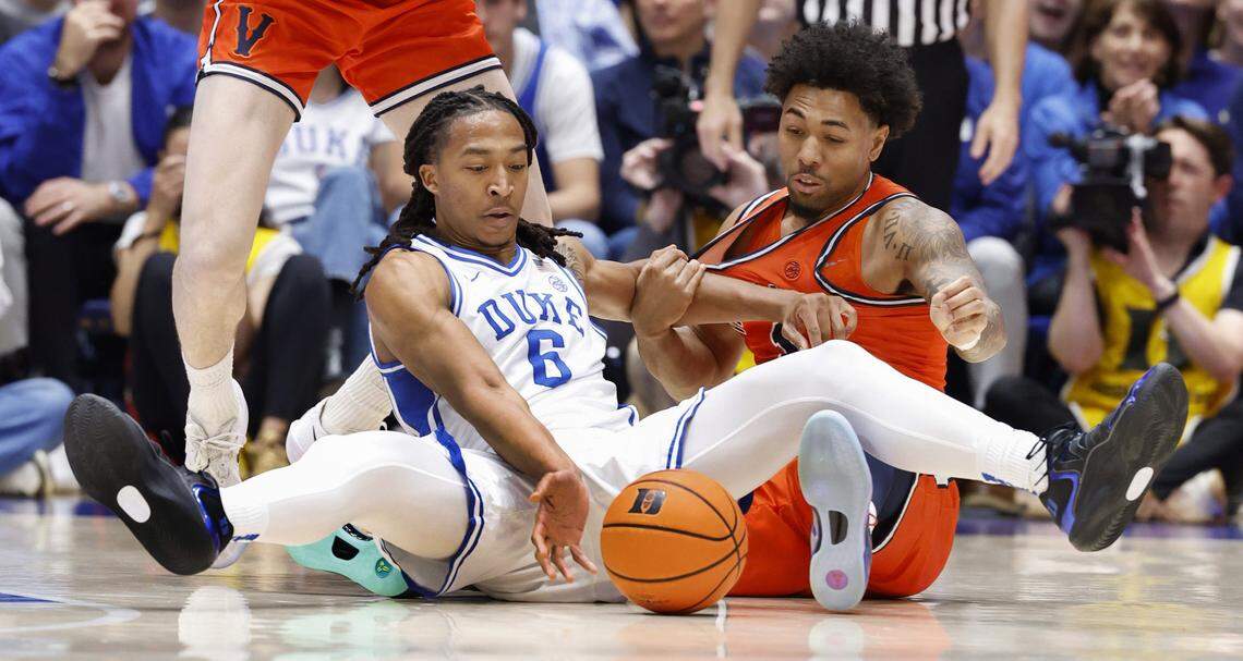 Duke’s Maliq Brown (6) gets to the loose ball from Virginia's Malik Thomas (1) during the first half of Duke’s game against Virginia at Cameron Indoor Stadium in Durham, N.C., Saturday, Feb. 28, 2026.