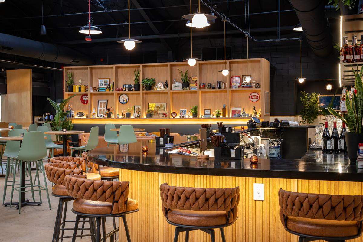 The new Trophy Five Points features a full service pizzeria, casual taproom hangs and an expansive front porch.