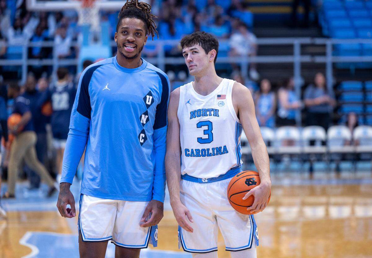 North Carolina’s Armando Bacot (5) talks with Cormac Ryan (3) prior to the Tar Heels’ exhibition game against St. Augustine’s on Friday, October 27, 2023 at the Smith Center in Chapel Hill, N.C.