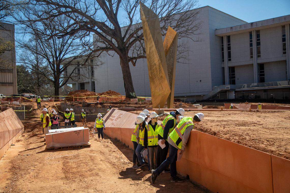 A 10th-grade honors civic literacy class from Wake Early College of Information and Biotechnology in Morrisville tours the construction site of the North Carolina Freedom Park in downtown Raleigh on Wednesday, March 8, 2023. The new park will honor and celebrate the African American experience in North Carolina.