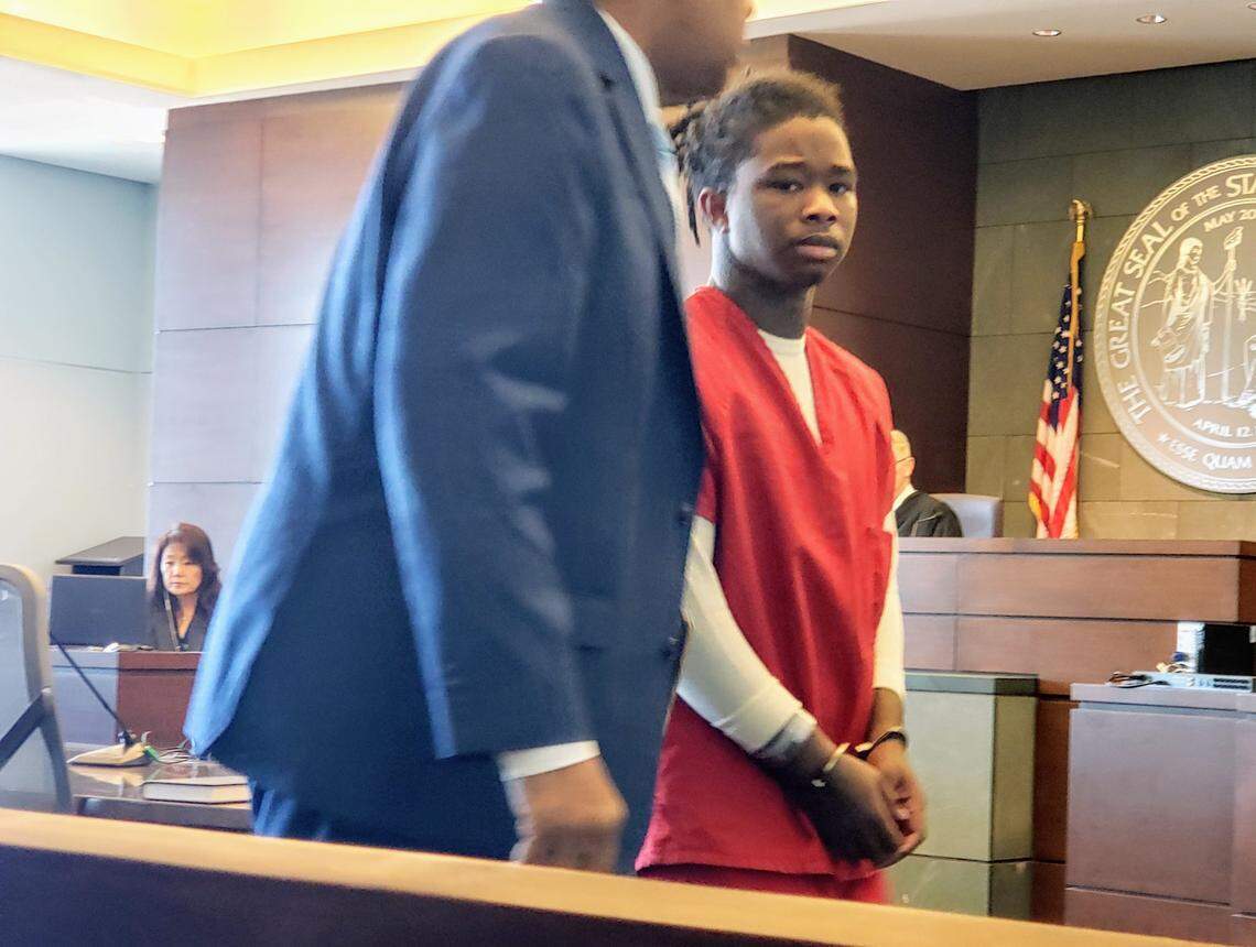 Attorney David Robinson, on left, and his client Antonio Nathaniel Davenport Jr. appear in Durham County court on Monday, Oct. 22, 2019 on domestic violence charges. Davenport is charged with killing Z’Yon Person in a drive-by shooting on August 18, 2019.