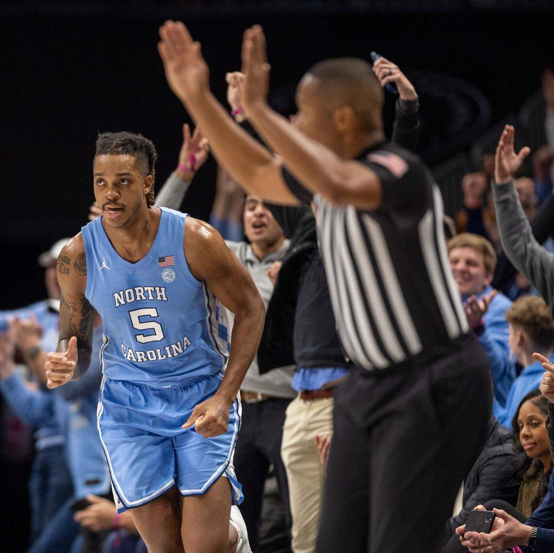 North Carolina’s Armando Bacot (5) reacts after sinking a three-point basket in the second half against Oklahoma on Wednesday, December 20, 2023 at the Spectrum Center in Charlotte, N.C.