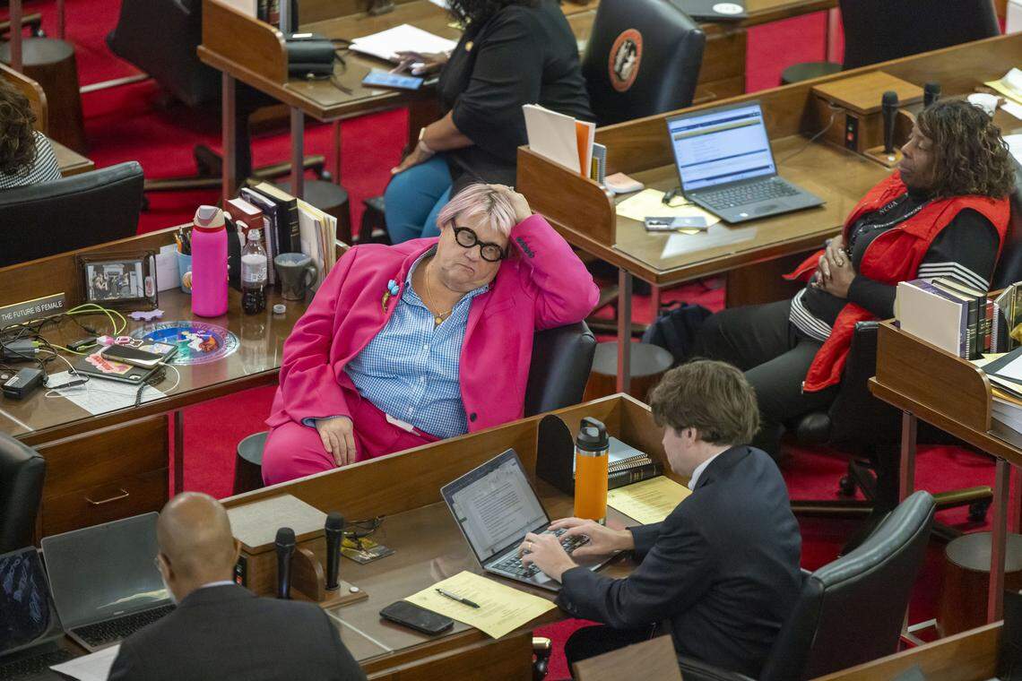 Rep. Allison Dahle listens to Rep. Robert Reives as he debates Senate Bill 249, before being cut off by House Speaker Destin Hall, after surpassing his eight minute limit to speak, on Wednesday, October 22, 2025 at the General Assembly in Raleigh, N.C.