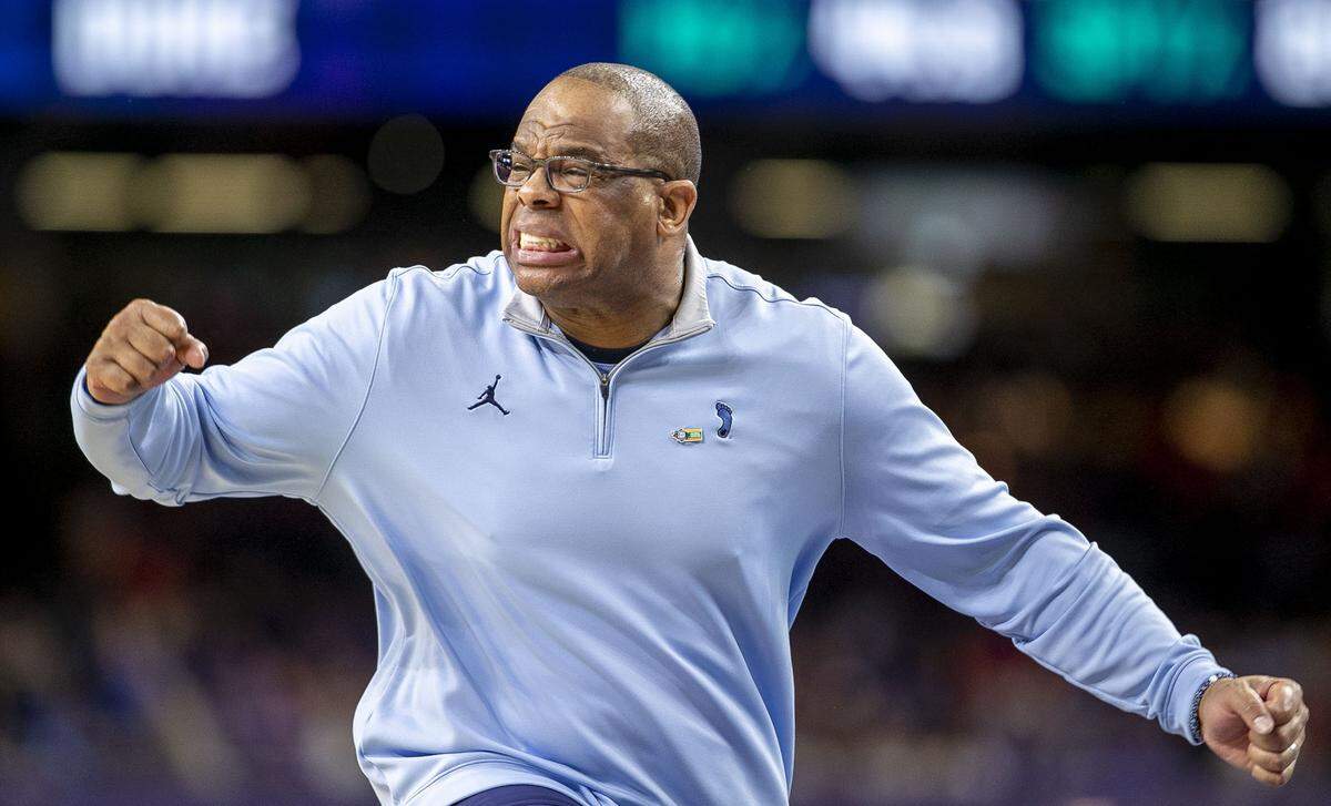 North Carolina coach Hubert Davis reacts after taking a 62-59 lead in second half against Duke during the NCAA Final Four semi-final on Saturday, April 2, 2022 at Caesars Superdome in New Orleans, La