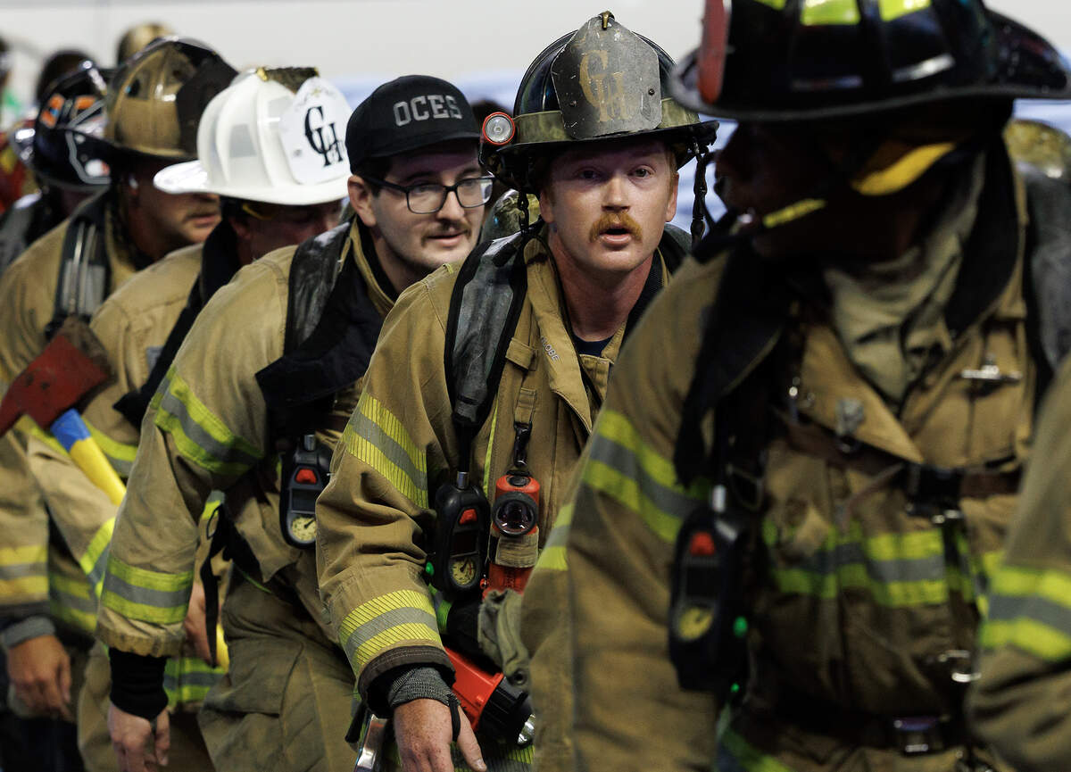 Participants climb the stairs of Kenan Memorial Stadium during an event in Chapel Hill, N.C. on Thursday, Sept. 11, 2025, to honor those who lost their lives during the attacks of Sept. 11, 2001.
