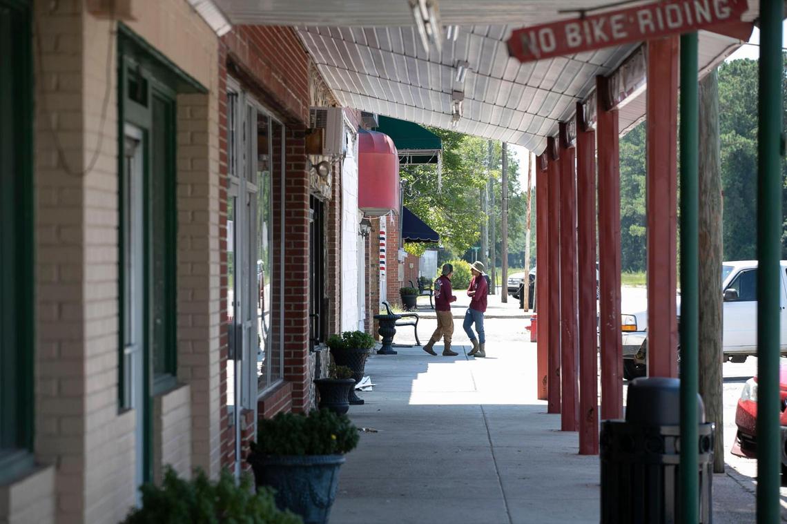 Only a few of business are open on Front Street in Garland, N.C. on Thursday, July 16, 2020. Barber shops and restaurants make up the remaining businesses open on the street.