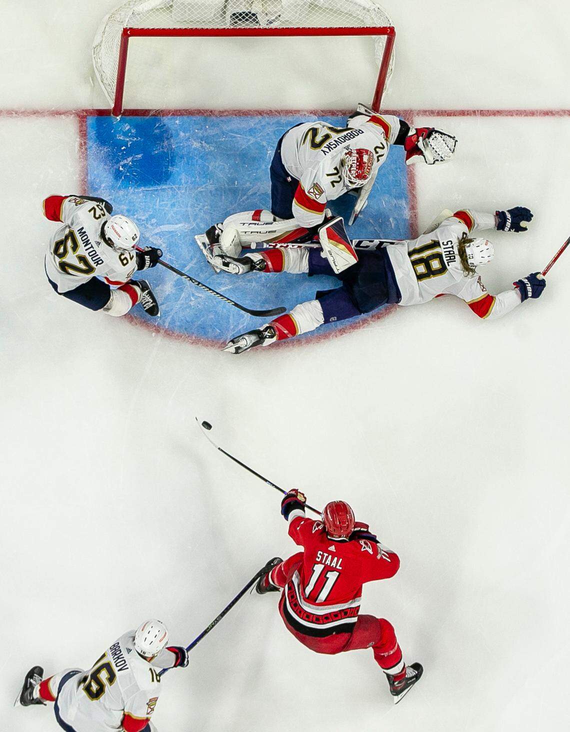 The Carolina Hurricanes Jordan Staal (11) shoots on Florida Panthers goalie Sergei Bobrovsky (72) in overtime during Game 2 of the Eastern Conference Finals on Saturday, May 20, 2023 at PNC Arena in Raleigh, N.C.