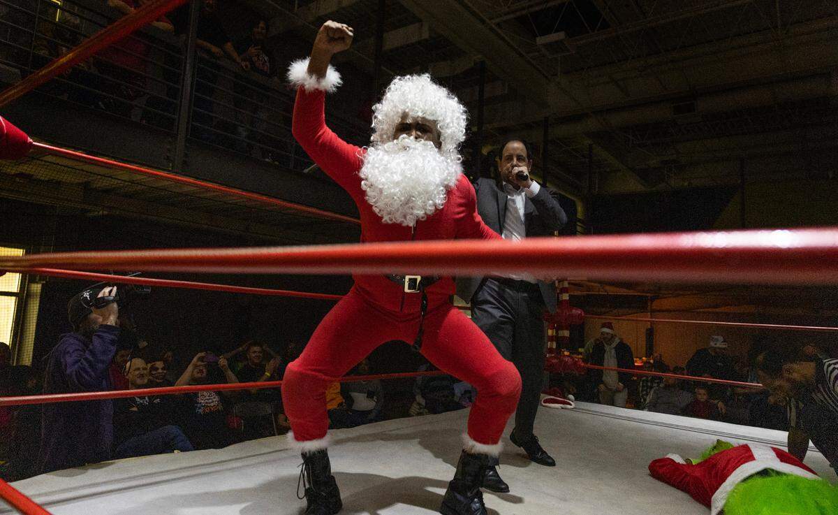Santa vs. The Grinch at FWE Merry Mayhem in Cary, N.C., Saturday night, Dec. 14, 2024.
