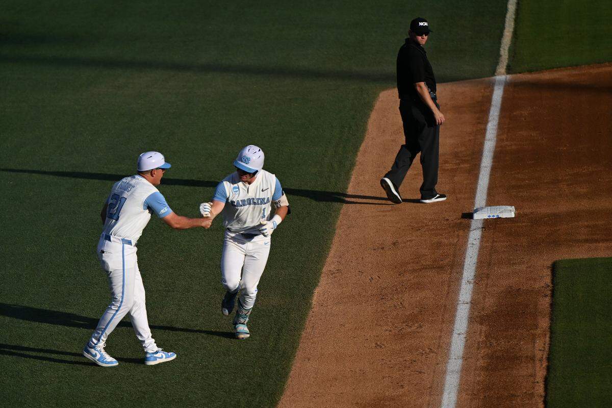 North Carolina Tar Heels infielder Cooper Nicholson (1) rounds the bases after a homerun during game 2 of the Chapel Hill Regional at Boshamer Stadium. 