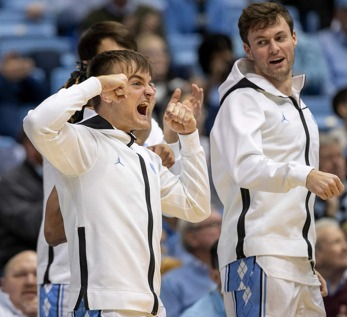 North Carolina’s Jackson Watkins (30) and Duwe Farris (34) react after a basket by Tyler Nickel (24) in the second half against The Citadel on Tuesday, December 13, 2022 at the Smith Center in Chapel Hill, N.C.