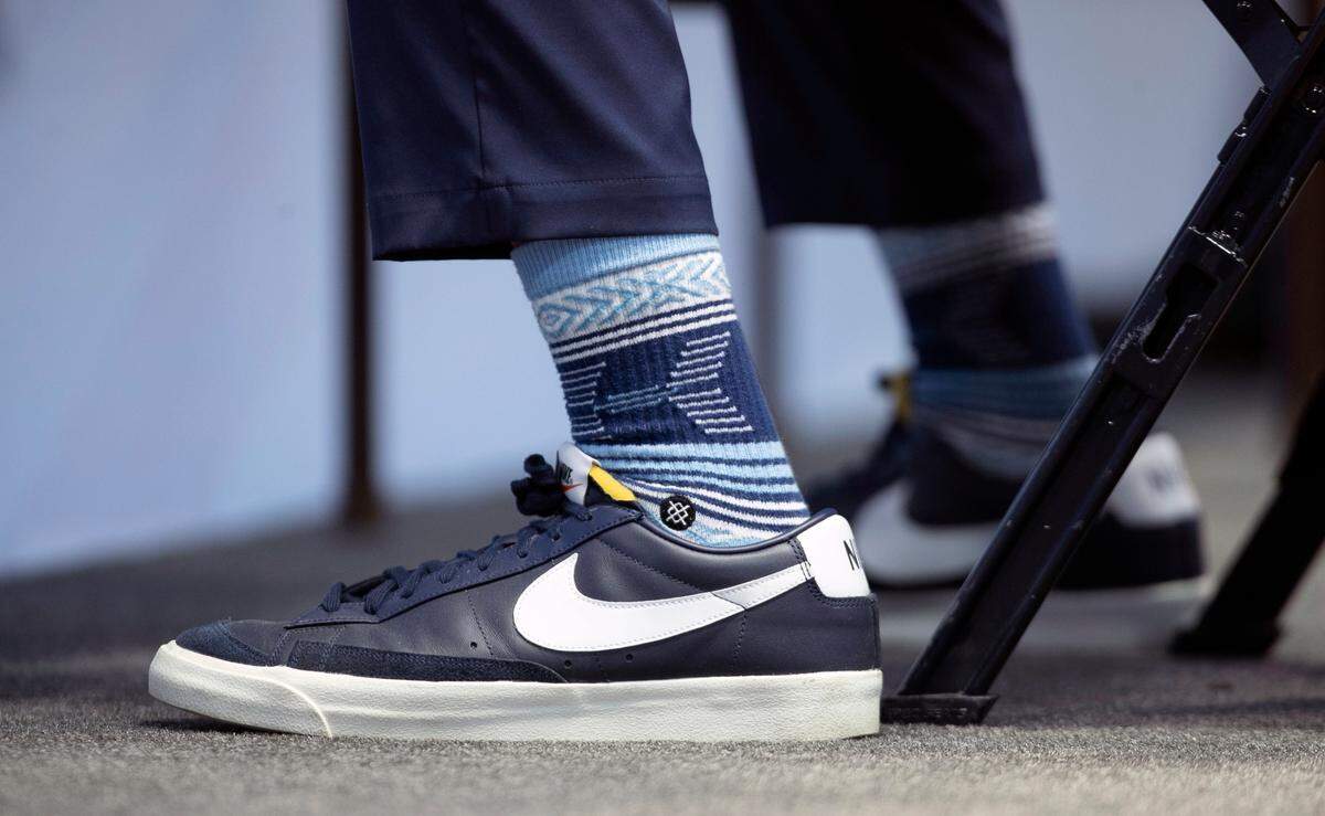 New North Carolina head coach Hubert Davis sports a pair of Nikeís and fashion socks as he is introduced at the new head basketball coach a the University of North Carolina on Tuesday, April 6, 2021 at the Smith Center in Chapel Hill, N.C.