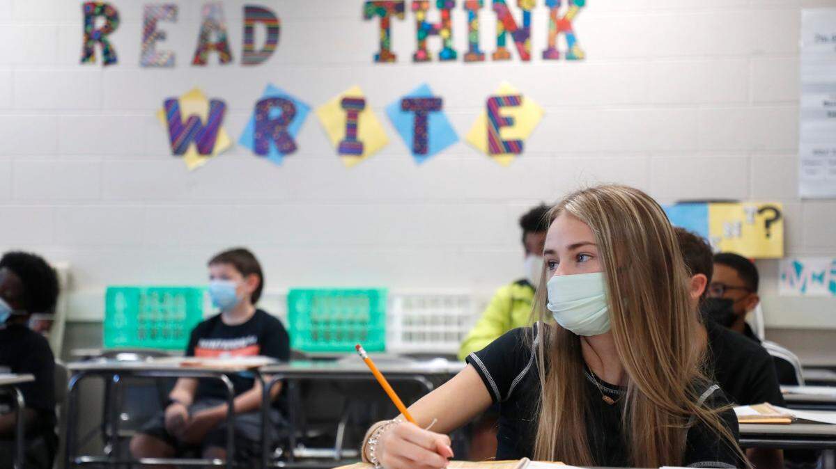 Haylee Ferrell listens during LaSonja Cunninghams 7th grade ELA class on the first day of school at Wakefield Middle School in Raleigh, N.C., Monday, August 23, 2021.