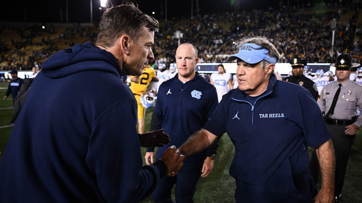 Head coach Bill Belichick of the North Carolina Tar Heels shakes hands with head coach Justin Wilcox of the California Golden Bears after the game at California Memorial Stadium on October 17, 2025 in Berkeley, California.