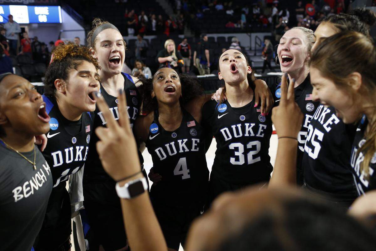 Duke celebrates after getting a win in a second-round game in the NCAA women's college basketball tournament in Athens, Ga., Monday, March 19, 2018.