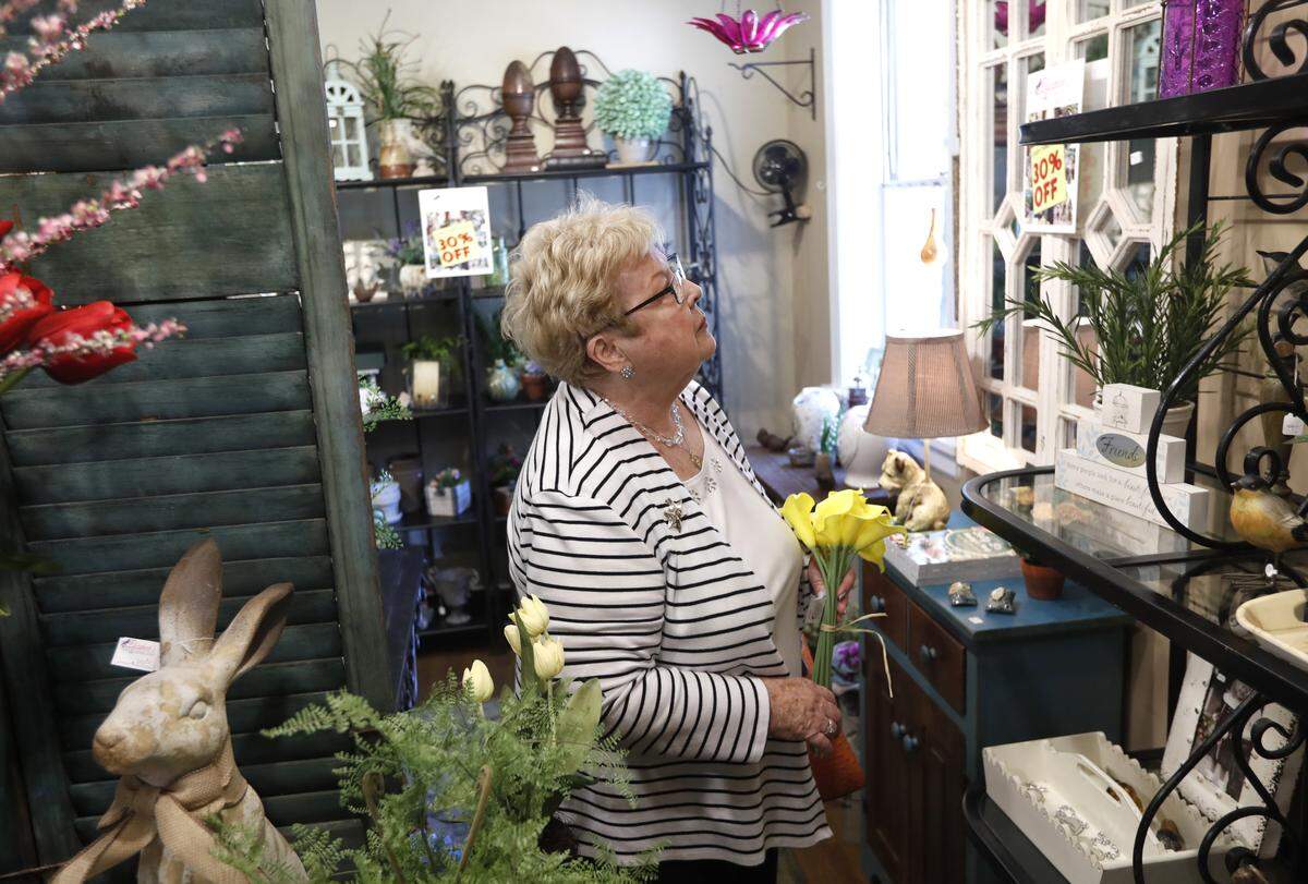 Gertrude Oldfield of Cary shops at Elizabeth's Home & Garden Shop in Cary, N.C., Wednesday, May 9, 2018. 
